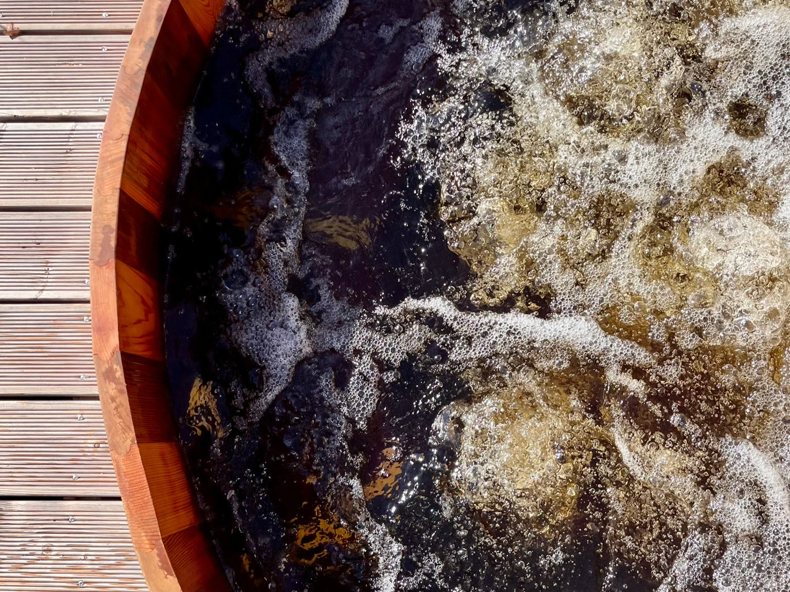 Warm water in the cedar hot tub