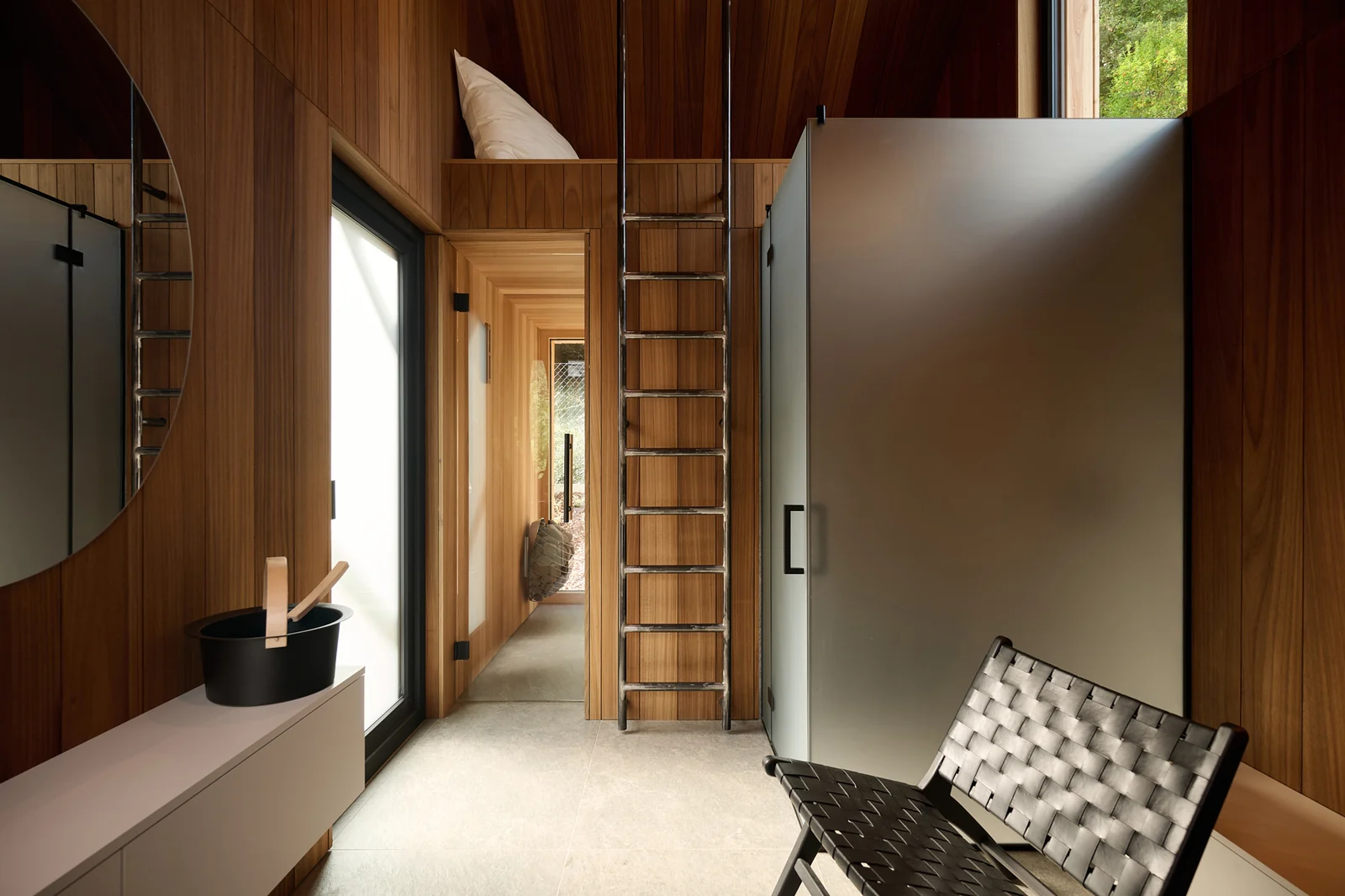 Inside the HYGGE sauna with cedar doors